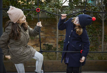 Two girls on the schoolyard playground during break time - PWF00086