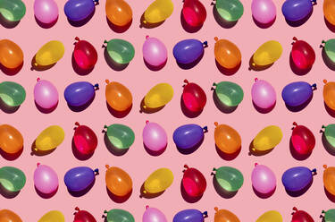 Pattern of rows of colorful water balloons - GEMF03622