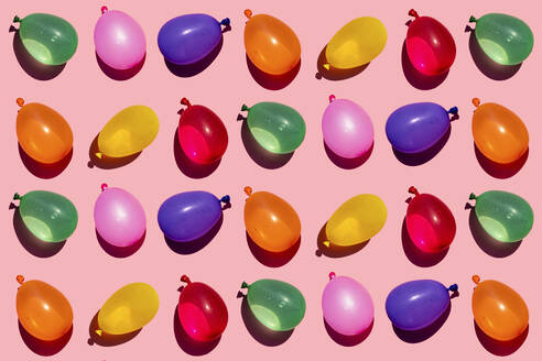 Pattern of rows of colorful water balloons - GEMF03623