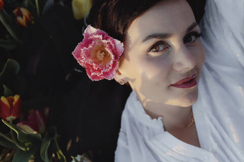 Portrait of woman wearing fringed tulip stock photo