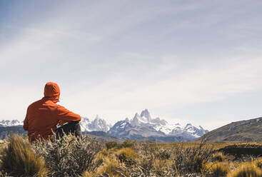 Hiker resting in remote landscape in Patagonia, Argentina - UUF20302