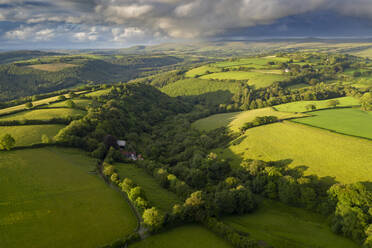 Aerial view by drone of rolling countryside near Brentor in Devon, England, United Kingdom, Europe - RHPLF14896