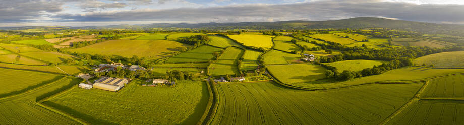 Aerial view by drone of beautiful rolling countryside near Livaton, Devon, England, United Kingdom, Europe - RHPLF14901