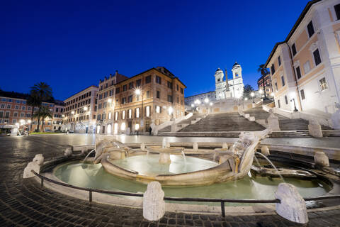 Piazza di Spagna (Spanish Steps) with Barcaccia fountain in foreground and Trinita dei Monti in background, Rome, Lazio, Italy, Europe stock photo