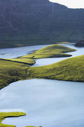 Scenic view of lake against mountains at Corvo, Azores, Portugal - FVSF00238