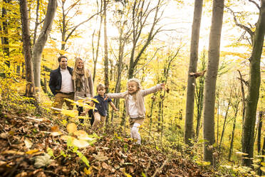 Family enjoying autumn in forest - WFF00393