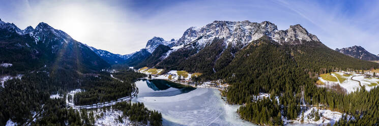 Germany, Bavaria, Ramsau bei Berchtesgaden, Helicopter view of Hintersee lake and Reiter Alpe range at winter dawn - AMF08076