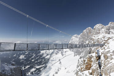 Austria, Styria, Schladming, Suspension bridge in Hoher Dachstein massif - WFF00418