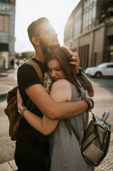 Happy young couple embracing in the city, Berlin, Germany - VBF00001