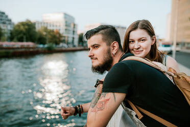 Happy young couple at River Spree, Berlin, Germany - VBF00009