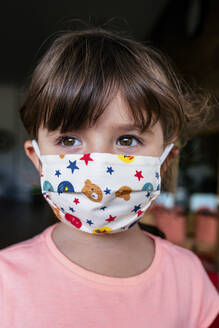 Portrait of girl with a colorful mask - GEMF03698