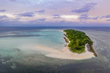 Aerial view of uninhabited island Bilang Bilangan, near Borneo, Indonesia. This island serves as protected conservation locality for endangered species of the sea turtles. - AAEF08516