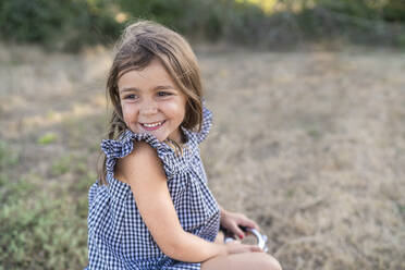 Portrait of happy little girl in nature - SNF00193