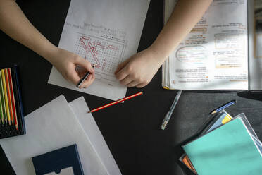 Boy doing homework for homeschooling - VPIF02440