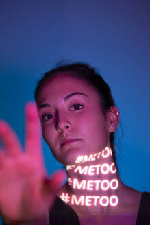 Portrait of woman with hastag metoo on her neck - ALBF01231