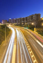 Long exposure dusk in a street with enough traffic in Alicante. - CAVF80856