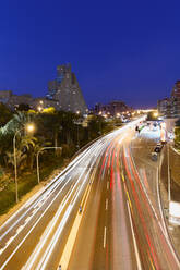 Long exposure dusk in a street with enough traffic in Alicante. - CAVF80858