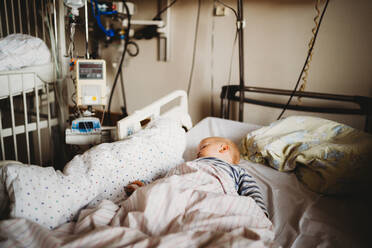Baby at the hospital sick with a virus coronavirus covid19 - CAVF80983