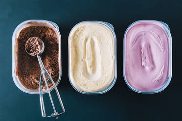 Chocolate, vanilla and strawberry ice cream tubs with scoop - CAVF81188