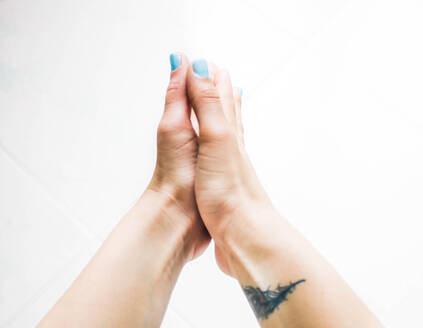 Female hands applying hand sanitizer gel and cleaning them - CAVF81193