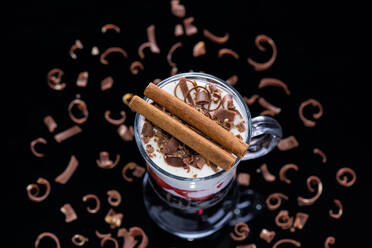 Strawberry milk shake with cinnamon sticks, grated chocolate and - CAVF81198