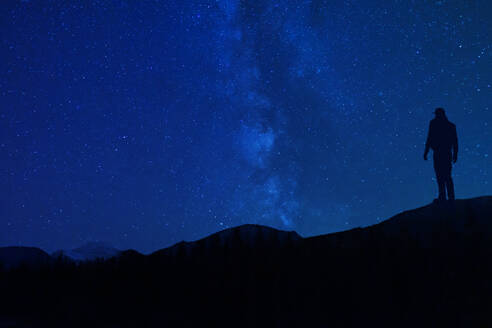 Star Gazing At Night Silhouette In Mountains - CAVF81199