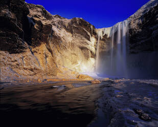 Skogarfoss Waterfall in south Iceland during the winter time - CAVF81277