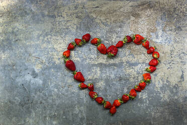 Fresh strawberries arranged into heart shape - STBF00542