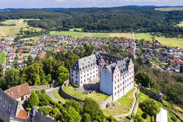 Germany, Hesse, Fischbachtal, Aerial view of Lichtenberg Castle and town - AMF08105