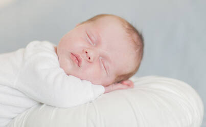 Newborn baby boy sleeping up close - CAVF81562