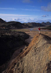 Man admiring the view in Landmannalaugar / Iceland - CAVF81933