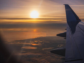 Netherlands,View from airplane flying at sunset - HAMF00605