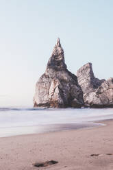 Rock formations at Ursa Beach against clear sky, Lisboa Region, Portugal - FVSF00331