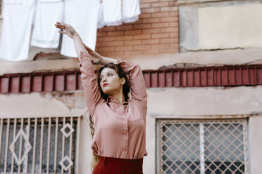 Portrait of young woman wearing vintage clothes - TCEF00655