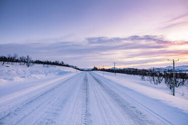 Frozen country road, Kilpisjaervi, Enontekioe, Finland - WVF01533