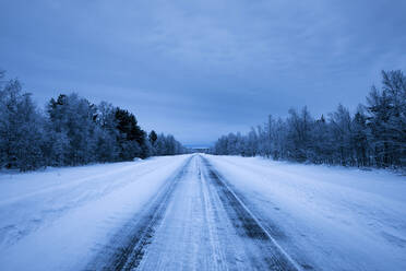 Country road in winter, Sotkajarvi, Enontekioe, Finland - WVF01545