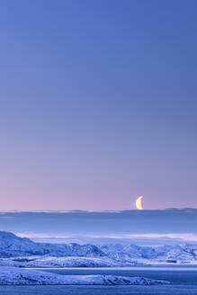 Morning mood with moon in winter, Lebesby, Lakse Fjord, Norway - WVF01622