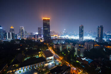 Thailand, Bangkok, Illuminated city downtown at night - GIOF08211