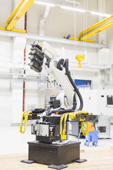 Industrial robot on factory shop floor - DIGF11475