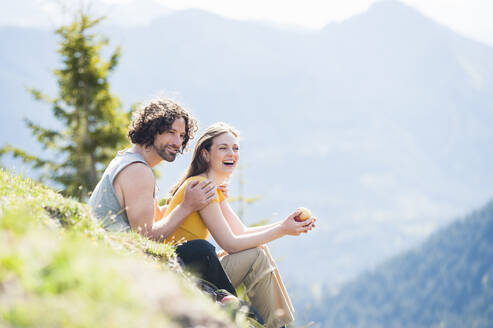 Couple during break on meadow - DIGF11664