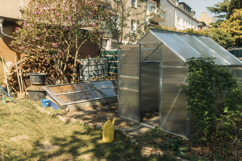 Small greenhouse at yard outside house - GUSF03802