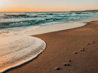 Ocean line on the coast of California during sunset - CAVF82858