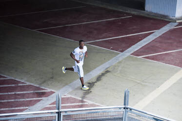 Young man jogging in the city - DIGF12219