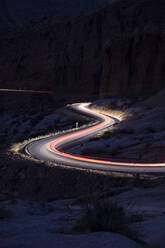 Car trails on the roads in arches national park - CAVF83556