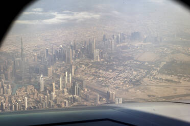 UAE, Dubai, City seen from airplane window - VEGF02344