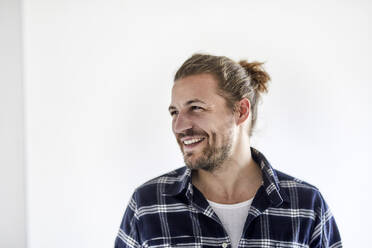 Portrait of a young man wearing checked shirt - MJFKF00226