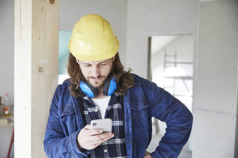 Construction worker working at construction site stock photo