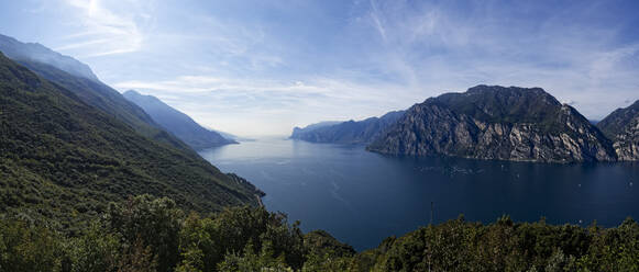 Italy, Trentino, Torbole, Lake Garda surrounded with mountains  - UMF00935