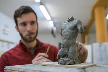 Student forming sculpture - FBAF01574