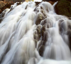 Spain, Province of Guadalajara, Close-up of waterfall in Alto Tajo Nature Reserve - DSGF02075